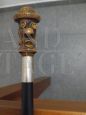 Wooden walking stick with resin and silver character          