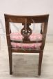 Antique Directoire armchair from the end of the 18th century in carved walnut