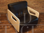 Rare Space Age armchair in black leather and wood