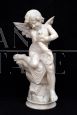 Antique Napoleon III alabaster sculpture depicting a winged cherub