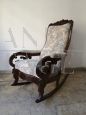Antique Louis Philippe sculpted and carved rocking armchair