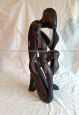 African ethnic sculpture with figure in black stained teak wood