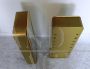 Pair of golden bathroom wall cabinets with mirror surface