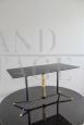 Coffee table in black glass, brass and iron, Italy 1950s