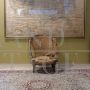 Deconstructed antique armchair