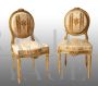 Pair of antique Napoleon III chairs upholstered in gilded and carved wood                     
                            