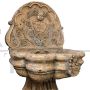 Wall fountain with cherub in red Verona marble