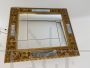 Vintage gilt mirror decorated with bevelled mirrors, 1950s
