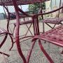 Garden set with table and 4 chairs in red lacquered wrought iron, 1970s
