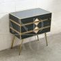 Small two-drawer dresser in black and white glass and brass