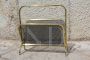Magazine rack in brass and black lacquered metal, Italy 1970s