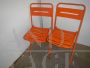 Industrial orange metal table and 2 chairs set, 1970s