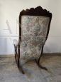 Antique Louis Philippe sculpted and carved rocking armchair