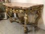 Roman Louis XV console in carved and gilded wood