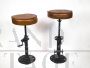 Pair of cast iron bar stools with spring closure