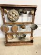 Antique 20th century plate rack with copper objects   