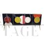 Backlit sideboard in black glass with colored circles