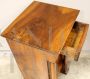 Antique Empire bedside table from the 19th century in walnut with columns