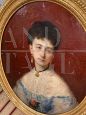 Antique painting portrait of a lady from the 9th century in a gilded frame