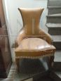 Small yellow leather fireplace armchair