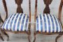 Set of four antique gondola chairs in carved walnut