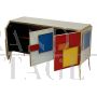 Three-door sideboard in colored glass with illuminated handles