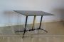 Coffee table in black glass, brass and iron, Italy 1950s