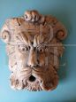 Antique style mask in royal yellow marble