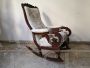 Antique Louis Philippe sculpted and carved rocking armchair