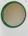 Round vintage mirror in green lacquered solid wood