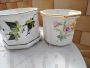 Pair of vintage ceramic vases with floral decorations