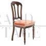 Antique single chair from the 19th century covered in peach colored velvet 