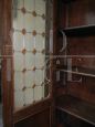 Large 1950s walnut bookcase with leaded glass doors