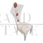 Fan-shaped design chair in ivory eco-leather