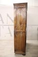 Imposing antique wardrobe pantry cabinet in carved solid walnut, 19th century