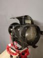 Small vintage cinema spotlight with tripod