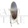 Adjustable oval floor mirror in ivory-colored metal