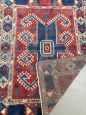 Antique 19th-century Turkish red wool rug with geometric patterns, 170 x 130 cm