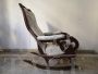Antique Louis Philippe sculpted and carved rocking armchair