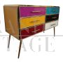 Dresser with six colored glass drawers