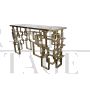 Double-sided console in Murano glass with geometric base in chrome-gold steel