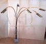 Reggiani style arched floor lamp in brass