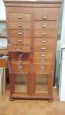 Vintage office chest of drawers with 16 drawers and two glass doors