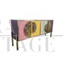 Four-door sideboard in colored glass and brass