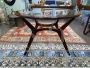 Mid-century round wooden table with glass top