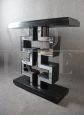 1960s console in black wood and mirrors