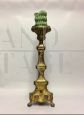 Antique church candlestick in gilded bronze