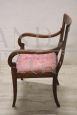 Antique Directoire armchair from the end of the 18th century in carved walnut
