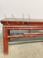Red lacquered Chinese bench from the early 1900s                            