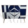 Sideboard with white and blue glass geometries